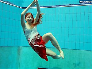 super-hot polish red-haired swimming in the pool